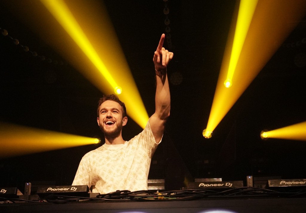Zedd performing live Zedd performing Clarity live on stage at a rave