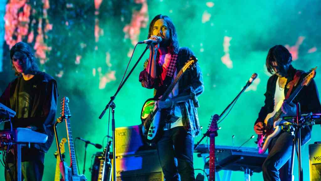 Tame Impala performing to a live audience