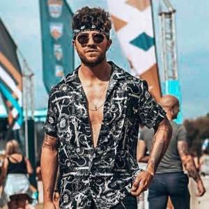 male rave outfit man wearing a rave outfit at edm music festival