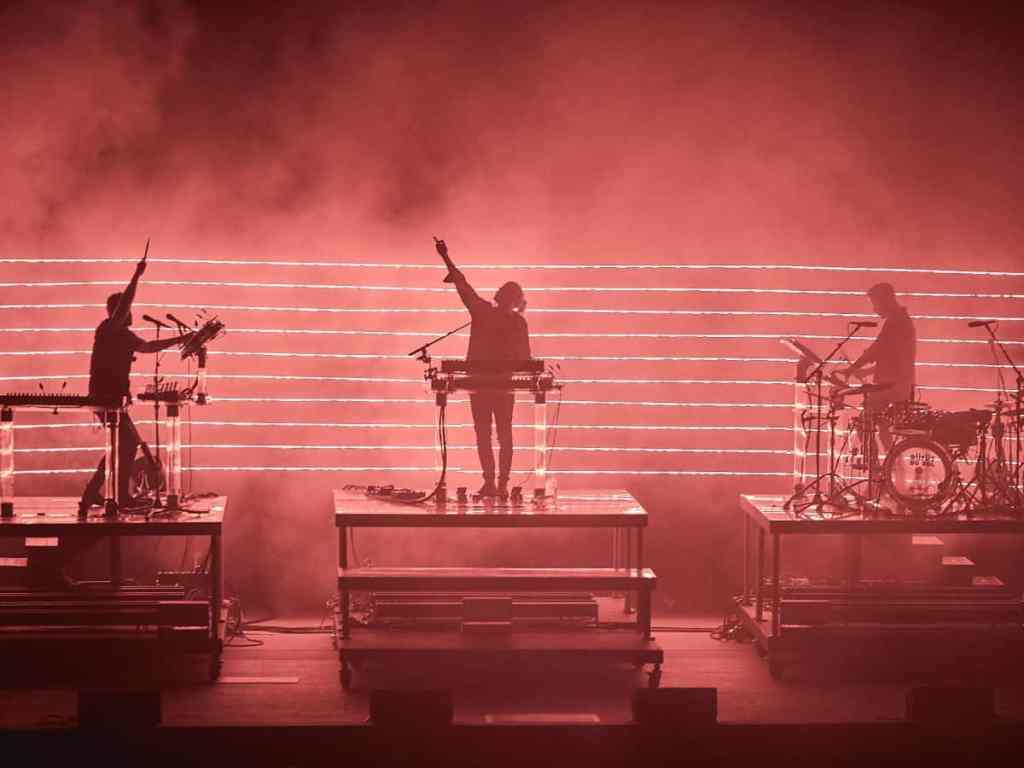 Rufus du sol performing on stage