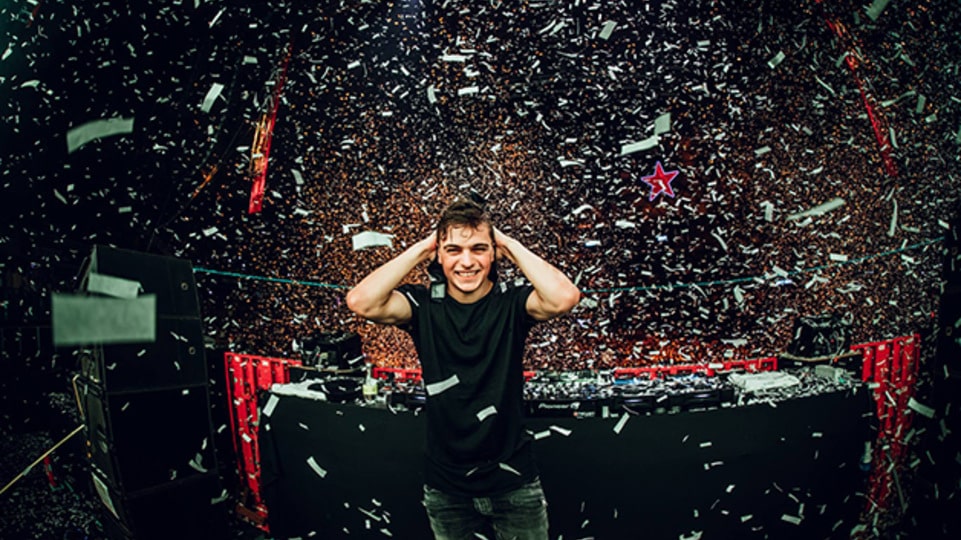Martin Garrix Confirms ‘ORIGO’ EP with Armin van Buuren, Saksham & Arcando Martin Garrix reacting to his stage production